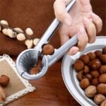Multifunctional Kitchen Nutcracker Clamp Tool – Heavy-Duty Steel Nut Opener with Wooden Handle for Almond, Walnut, Pecan & Hazelnut